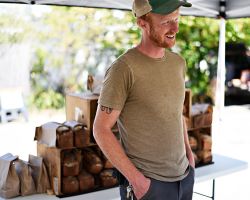 Elliot Hartley selling his bread at the Willits, CA farmers' market