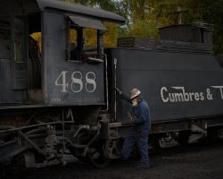 Tommy Garcia climbs down from 488 after working on the generator