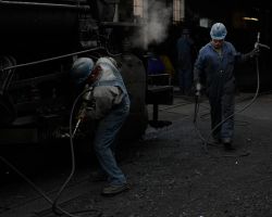 Greasing locomotive fittings