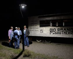 GGHS crew members chat after a long day of operations